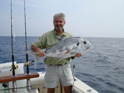 Buddy_Noland_with_an_African_Pompano_caught_on_the_Hatteras_trip.JPG