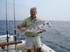Buddy_Noland_with_an_African_Pompano_caught_on_the_Hatteras_trip.JPG
